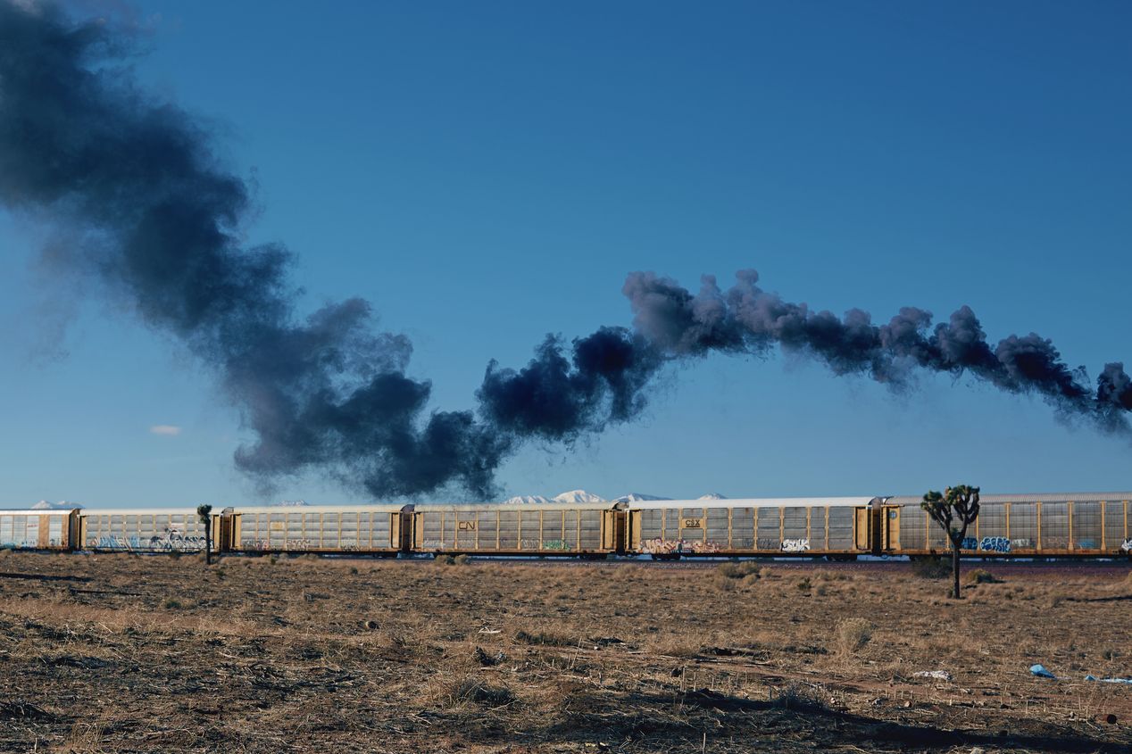 Black smoke over a moving train, Ilona Szwarc, Los Angeles editorial photographer.